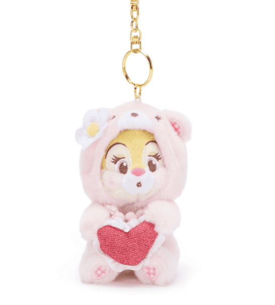 Adorable Disney plush keychain featuring a cute character in a bunny hood holding a red heart. Perfe.