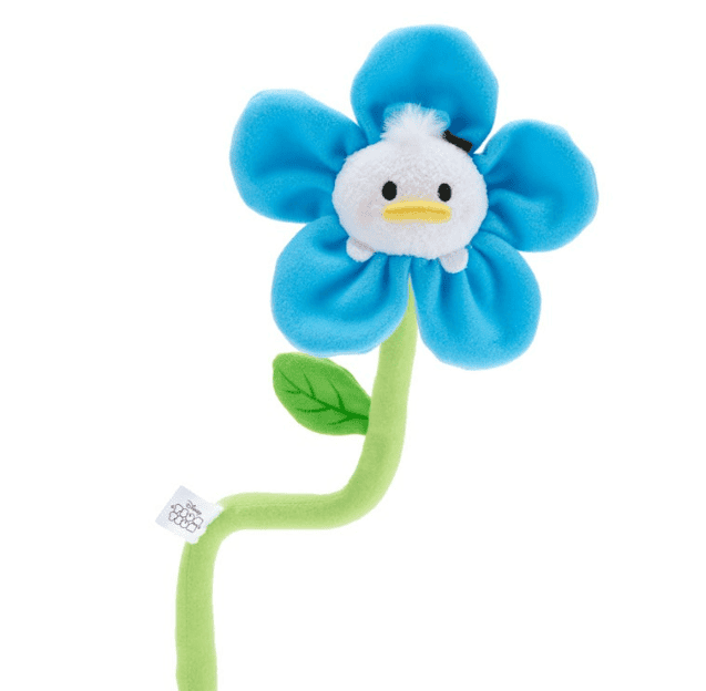 Adorable Disney plush flower toy featuring a duck face with blue petals and green stem.