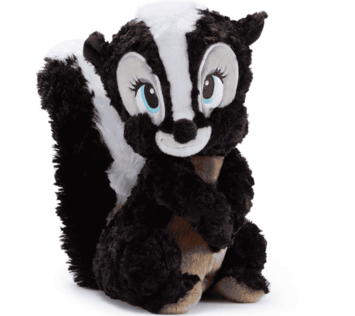 Adorable Disney plush toy featuring a black and white squirrel with bright blue eyes.