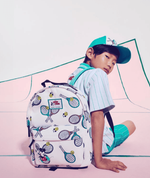 Kids tennis-themed backpack featuring Disney characters and tennis rackets, perfect for spring/summe.