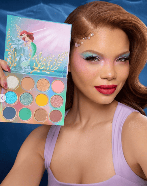 Mermaid-inspired makeup palette with vibrant colors and shimmery shades. Perfect for ocean-themed or.