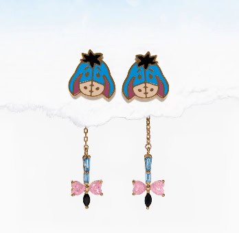 Cute Pooh Bear earrings with sparkling blue and pink accents, perfect for Disney fans.