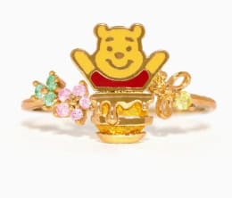 Cute Pooh Bear charm with sparkling accents and gold finish.