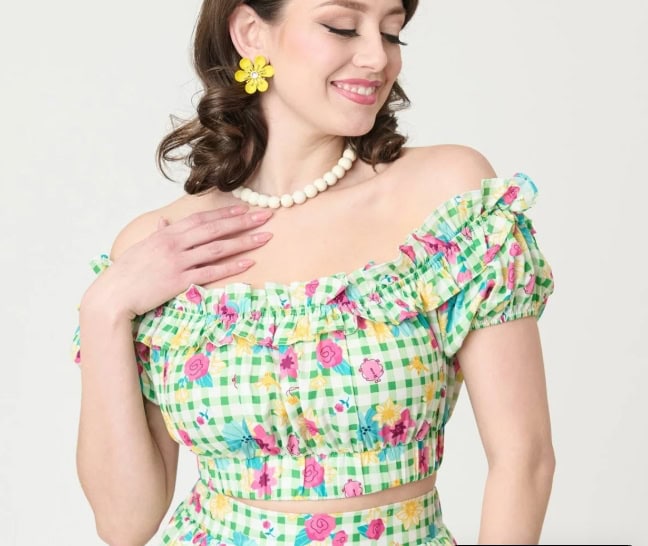 Vibrant floral gingham crop top with ruffled sleeves, ideal for spring and summer outfits.