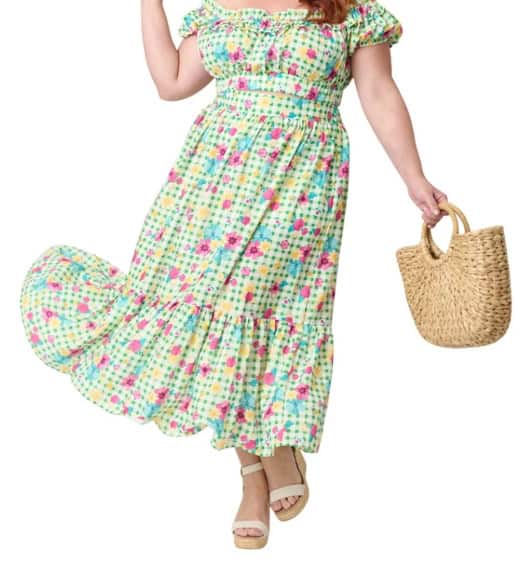 Floral gingham maxi dress with ruffled sleeves, tiered hem, ideal for summer fashion.