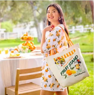 Bright Disney fruit stand tote bag with cheerful fruit illustrations and bold stripes.