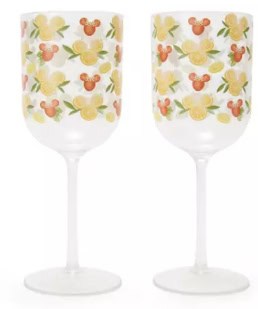 Elegant Disney floral wine glasses with colorful Mickey Mouse and floral patterns.