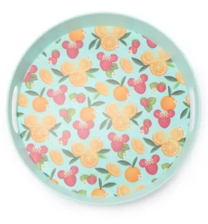 Bright floral plate with Disney-inspired flowers and leaves.