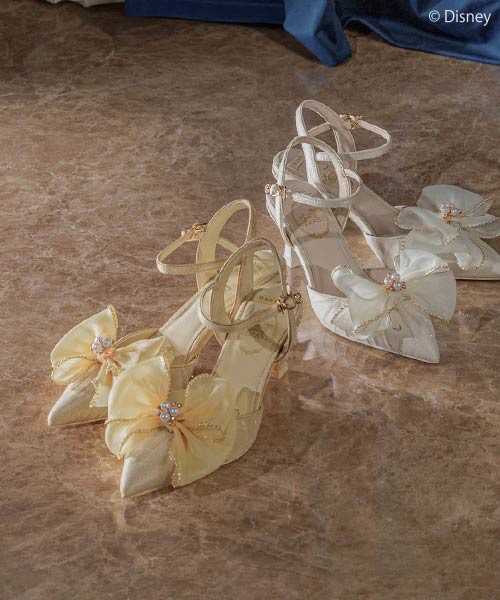 Stylish satin heels featuring bows and rhinestones, perfect for Disney-themed events or dressy outin.