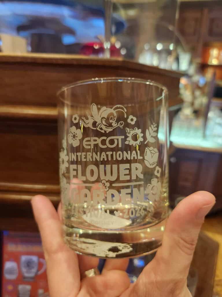 Decorative glass featuring EPCOT International Flower & Garden Festival 2023 logo.