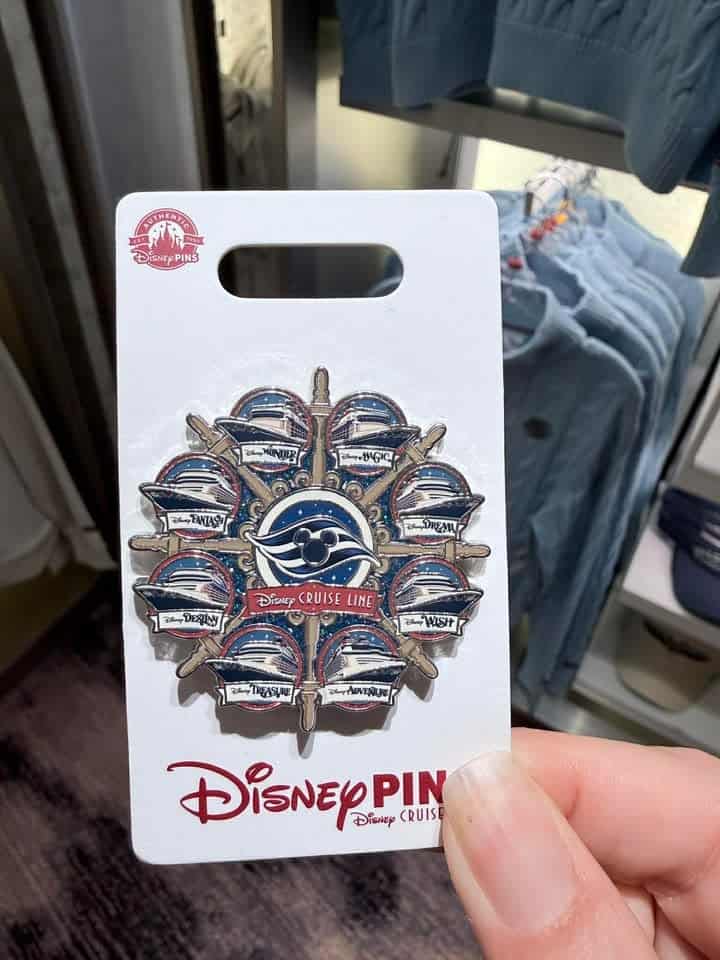 Disney Cruise Line themed pin featuring ship and compass design.