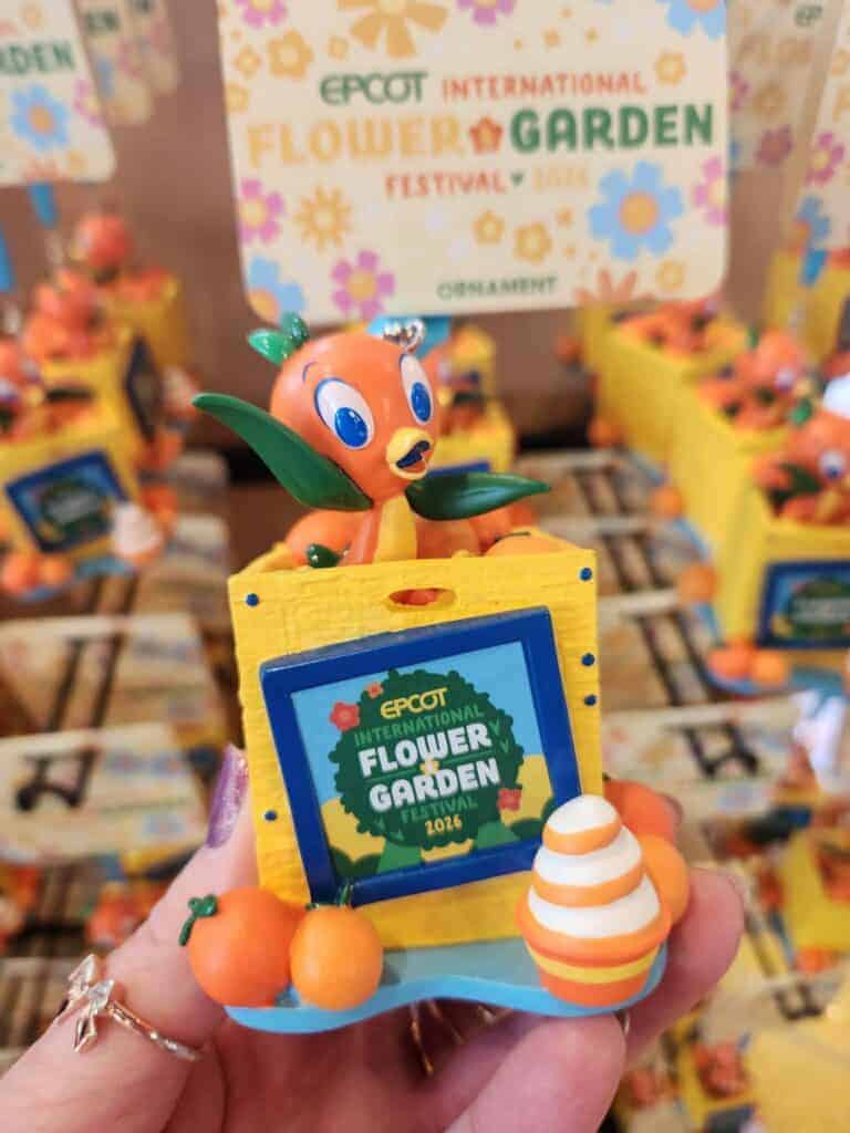 Disney Flower & Garden Festival figurine with orange and green accents.