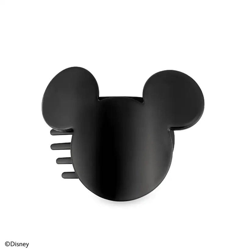 Mickey Mouse-shaped hair clip featuring a sleek black design and iconic ears, perfect for Disney fan.