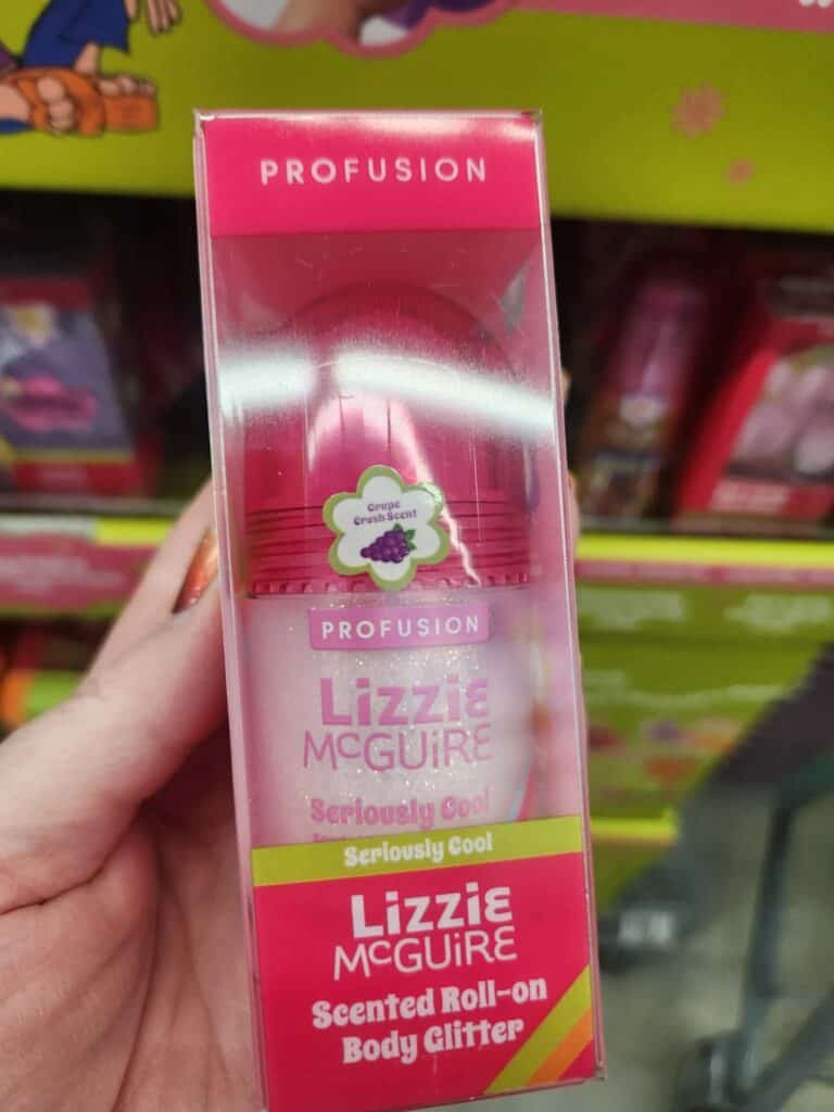Lizzie McGuire scented roll-on body glitter in pink packaging.
