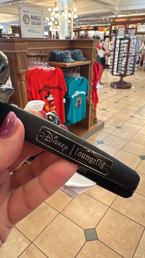Disney Loungefly keychain featuring Mickey Mouse design.
