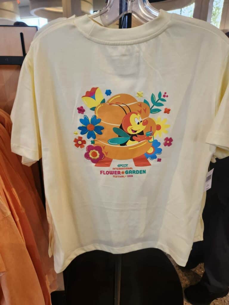 Disney Flower & Garden Festival T-Shirt with colorful floral and bee design.