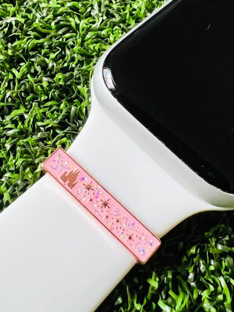 Apple Watch band featuring Disney princesses and sparkly accents, perfect for Disney fans.