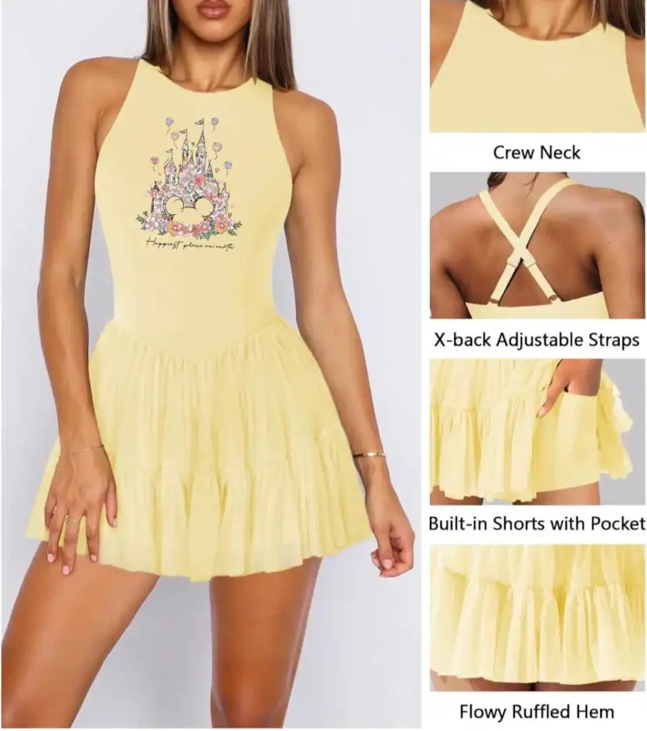Bright yellow dress featuring Disney princess graphic and ruffled hem. Perfect for casual or themed.