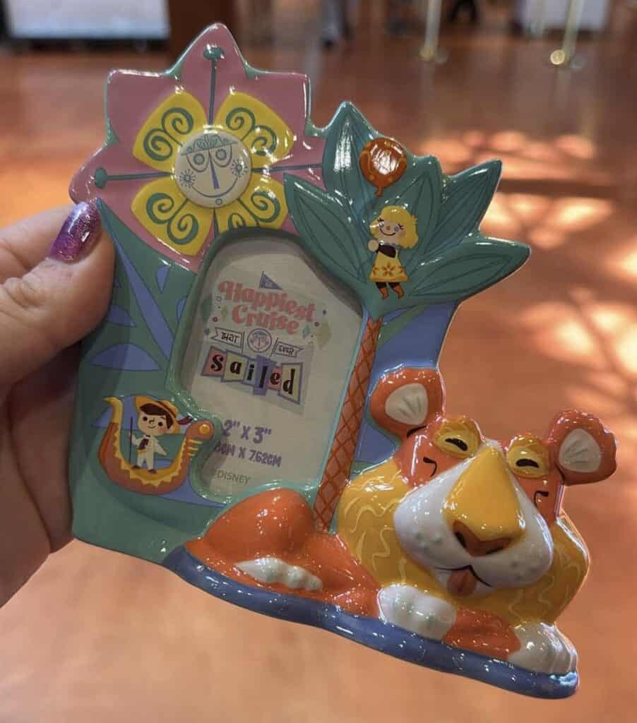 Colorful Disney magnet set featuring characters from "Happiest Place" and "Sailed".