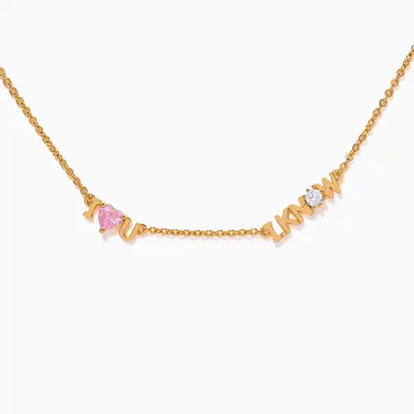 Elegant Disney-inspired gold necklace featuring "LOVE" and Minnie Mouse charm with pink and clear st.