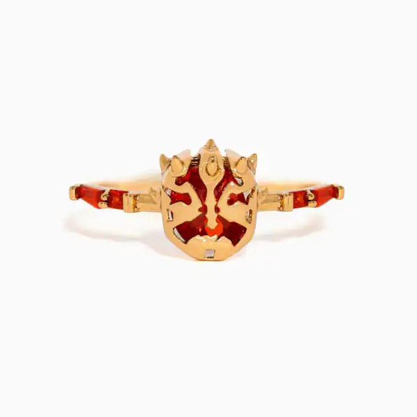 Gold and red Lion King villain bracelet with intricate design.