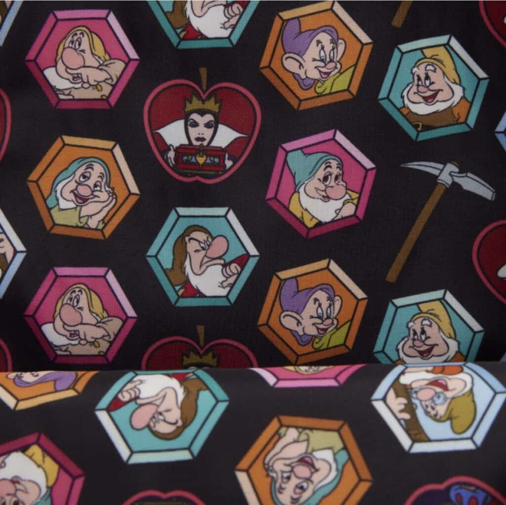 Colorful Disney villains hexagon pattern fabric featuring iconic characters.