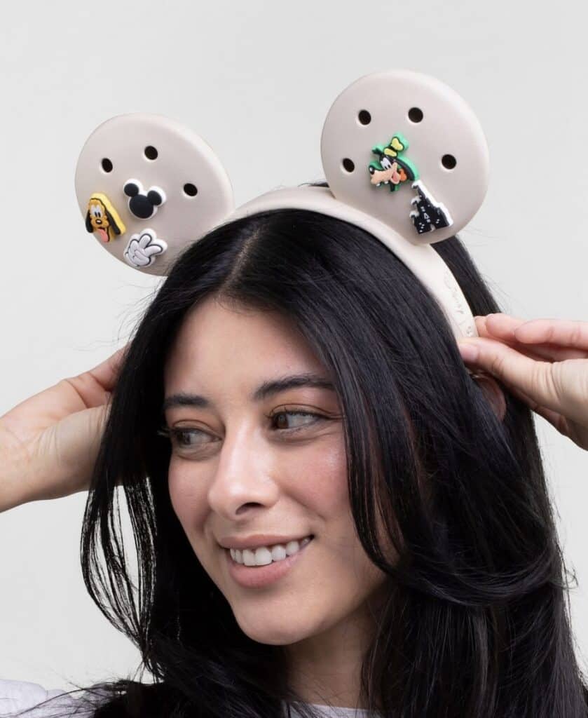 Festive Disney Christmas headband with Mickey, Minnie, and Pluto charms.