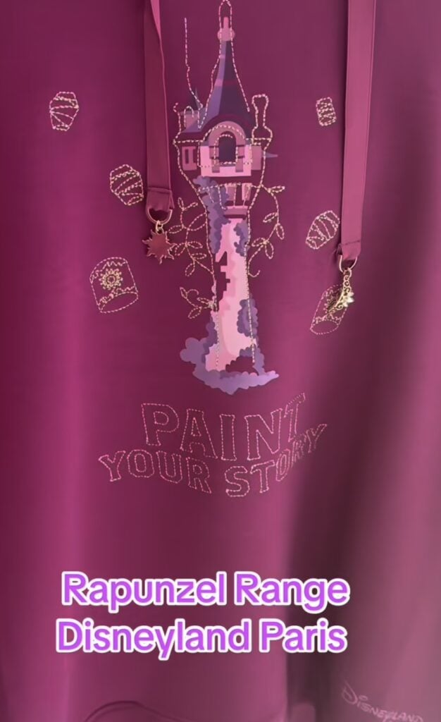 Disney Rapunzel tower embroidery on pink fabric, Disneyland Paris souvenir.