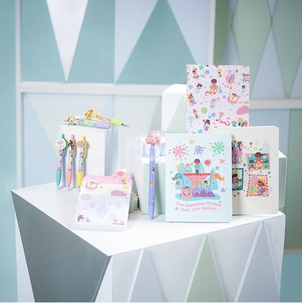 Colorful Disney-themed stationery set with pens, notebooks, and stickers for fans.