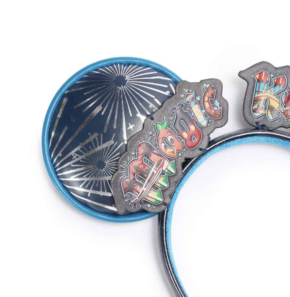 Disney-themed headband with fireworks and character embellishments.