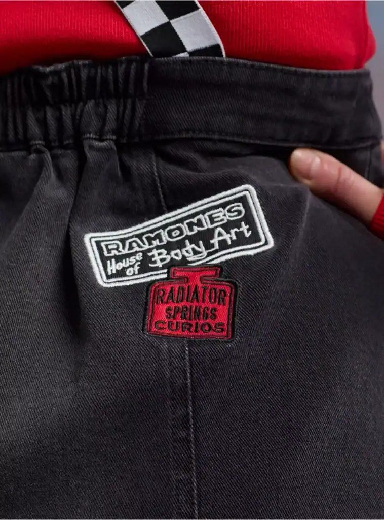 Close-up of Ramones logo on T-shirt with "Radiator Springs" patch.