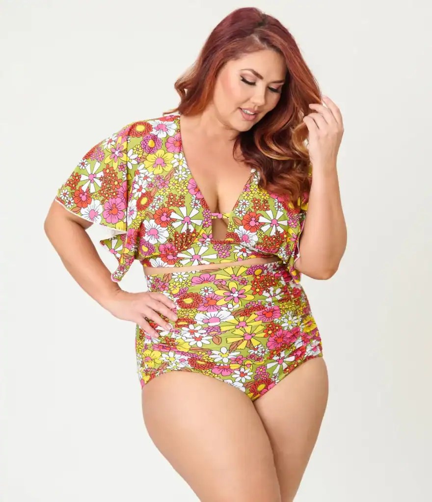 Plus size floral swimsuit with ruffled sleeves and vibrant colors.