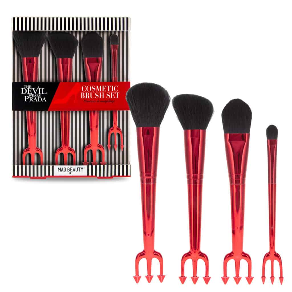 Cosmetic brush set inspired by The Devil Wears Prada, featuring red handles and black bristles.