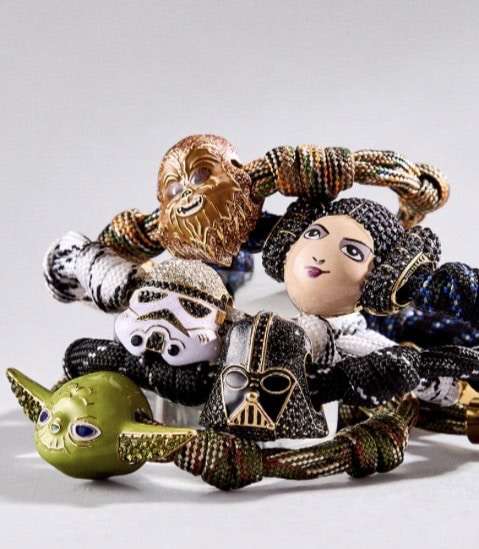 Colorful beaded jewelry featuring Disney characters and Star Wars designs.