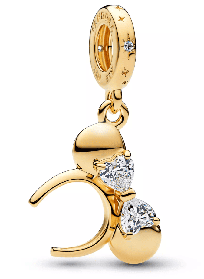 Gold charm with heart and star-shaped crystals, Disney-themed jewelry accessory.