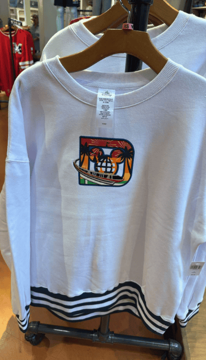 Retro Disney sweatshirt with palm trees and Mickey Mouse logo.