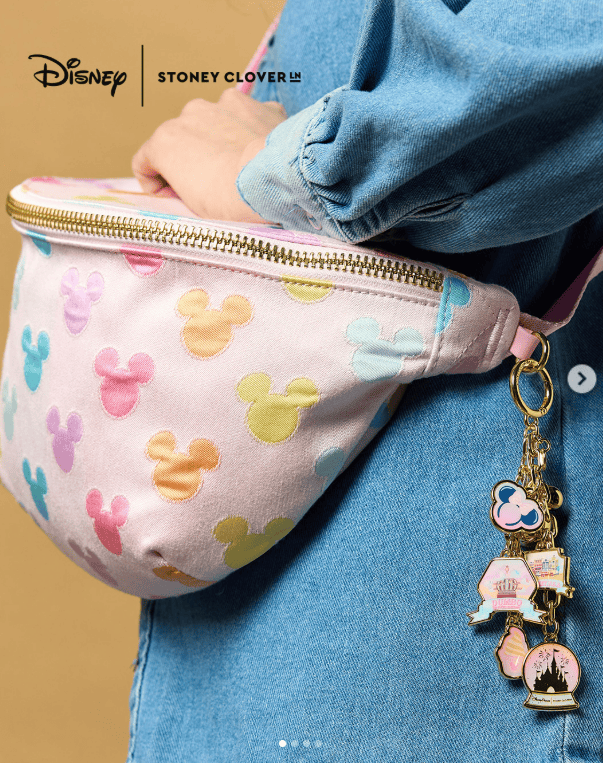 Colorful Mickey Mouse patterned Stoney Clover fanny pack with keychain accessory.