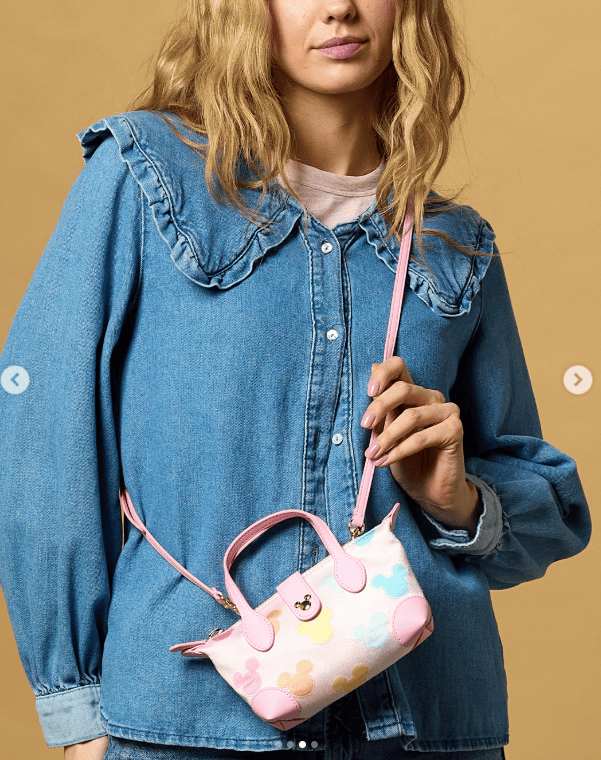 Stylish Disney-themed pastel crossbody bag with Mickey and Minnie prints.