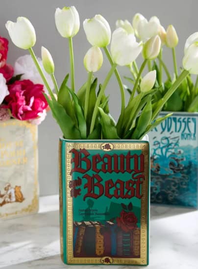 Disney Beauty and the Beast flower pot with white tulips and roses.