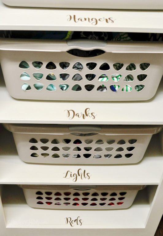 labeled stacking laundry basket cabinet.