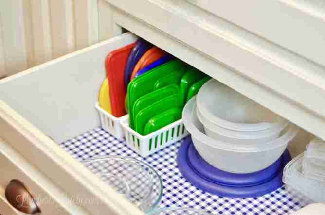 food storage containers in a large kitchen drawer.