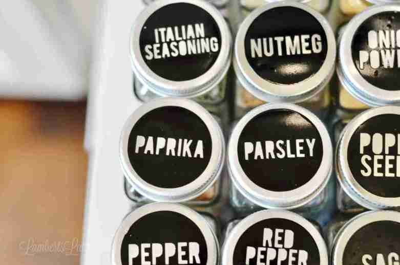 spices labeled in a spice cabinet.