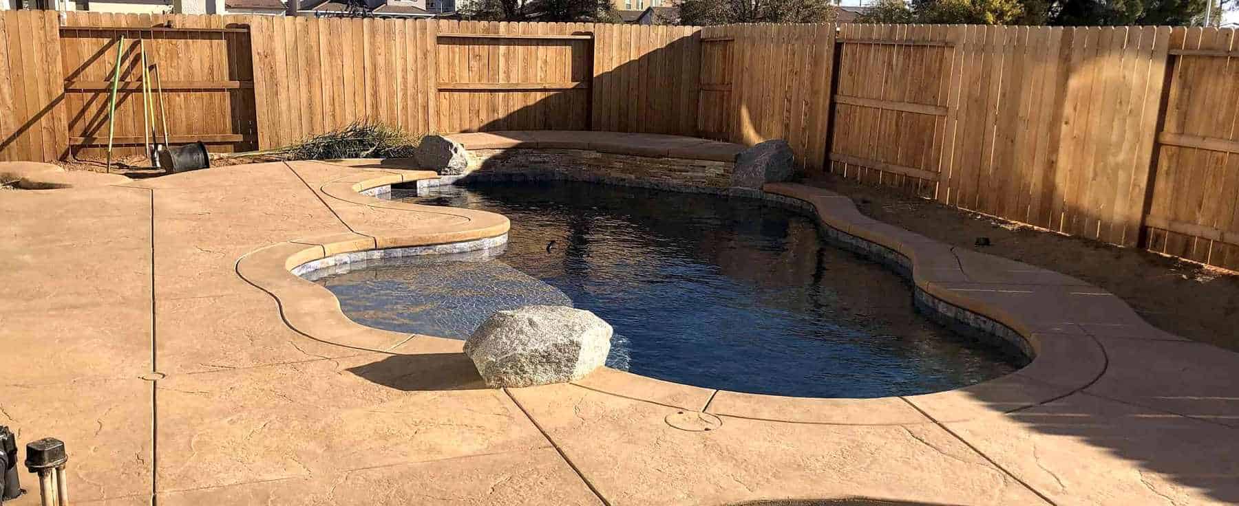 Concrete hero custom stamped concrete pool deck curved design 05 in LINCOLN