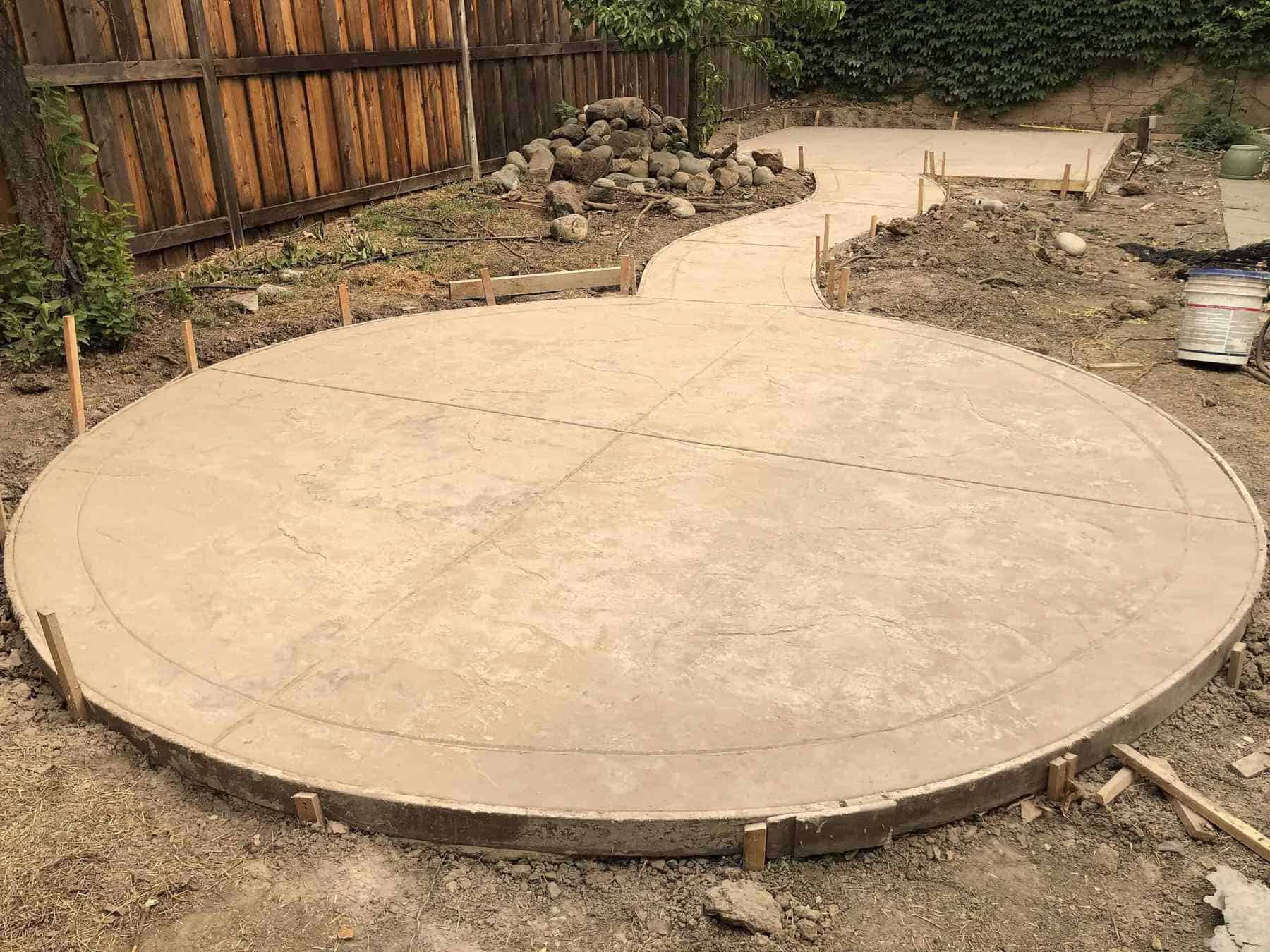 Concrete inline circular concrete patio curved walkway 02 in WOODLAND