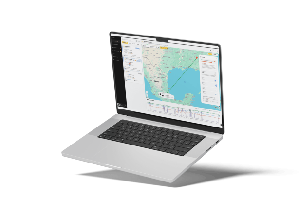 Cargo Tracking Software Dashboard Laptop displaying supply chain visibility and cargo monitoring map.