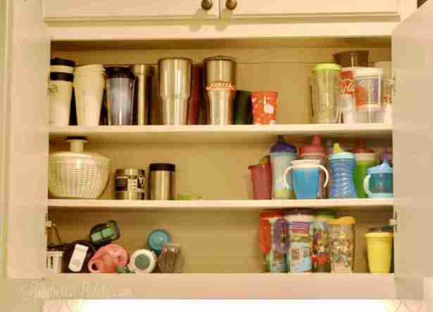 cups in a cabinet.