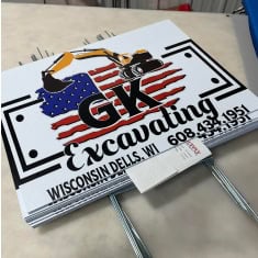 Custom trailer dealership sign featuring the I39 Supply logo with a graphic of a trailer and American flag design, promoting Wisconsin Dells trailer sales and service.