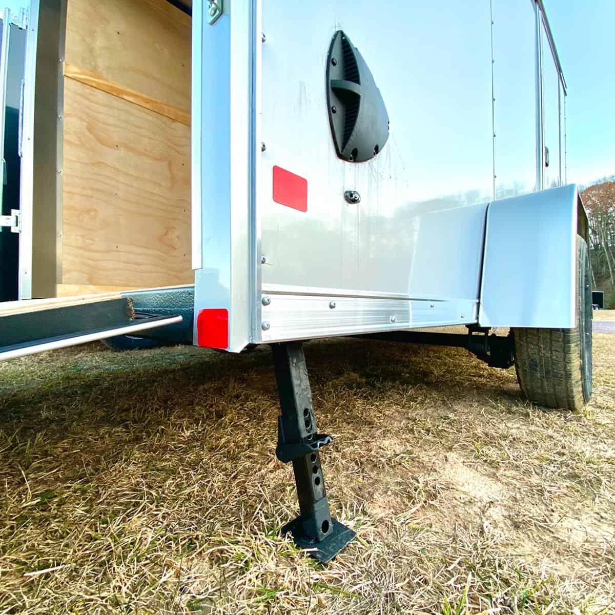 Durable utility trailer with adjustable support leg, ideal for various hauling needs, showcased at I39 Supply trailer dealership.