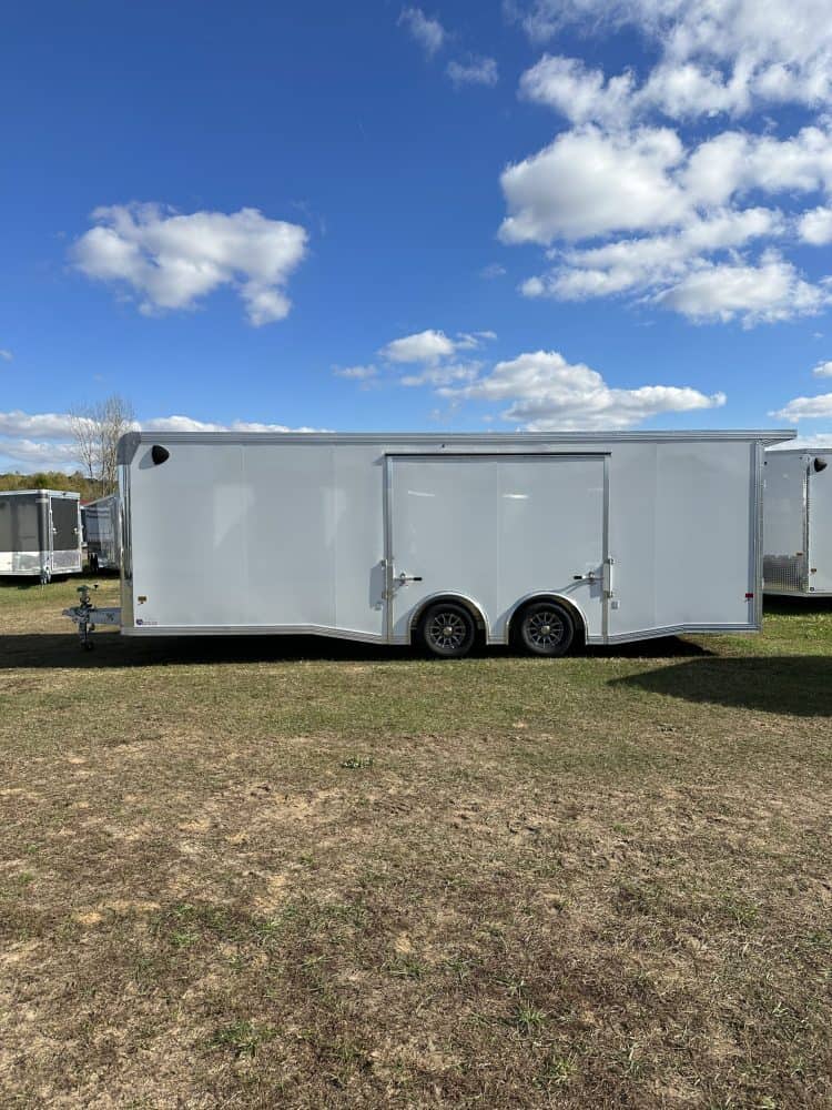 Enclosed 8.5'x24' EZ Hauler car hauler trailer at I39 Supply dealership, ideal for transporting vehicles securely and efficiently.