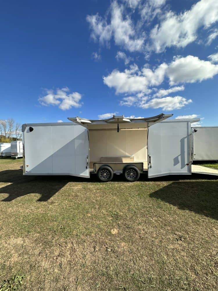 EZ Hauler Enclosed Car Hauler trailer, 8.5'x24', perfect for transporting vehicles securely. Available at I39 Supply Trailer Dealership, ideal for professional and personal use.